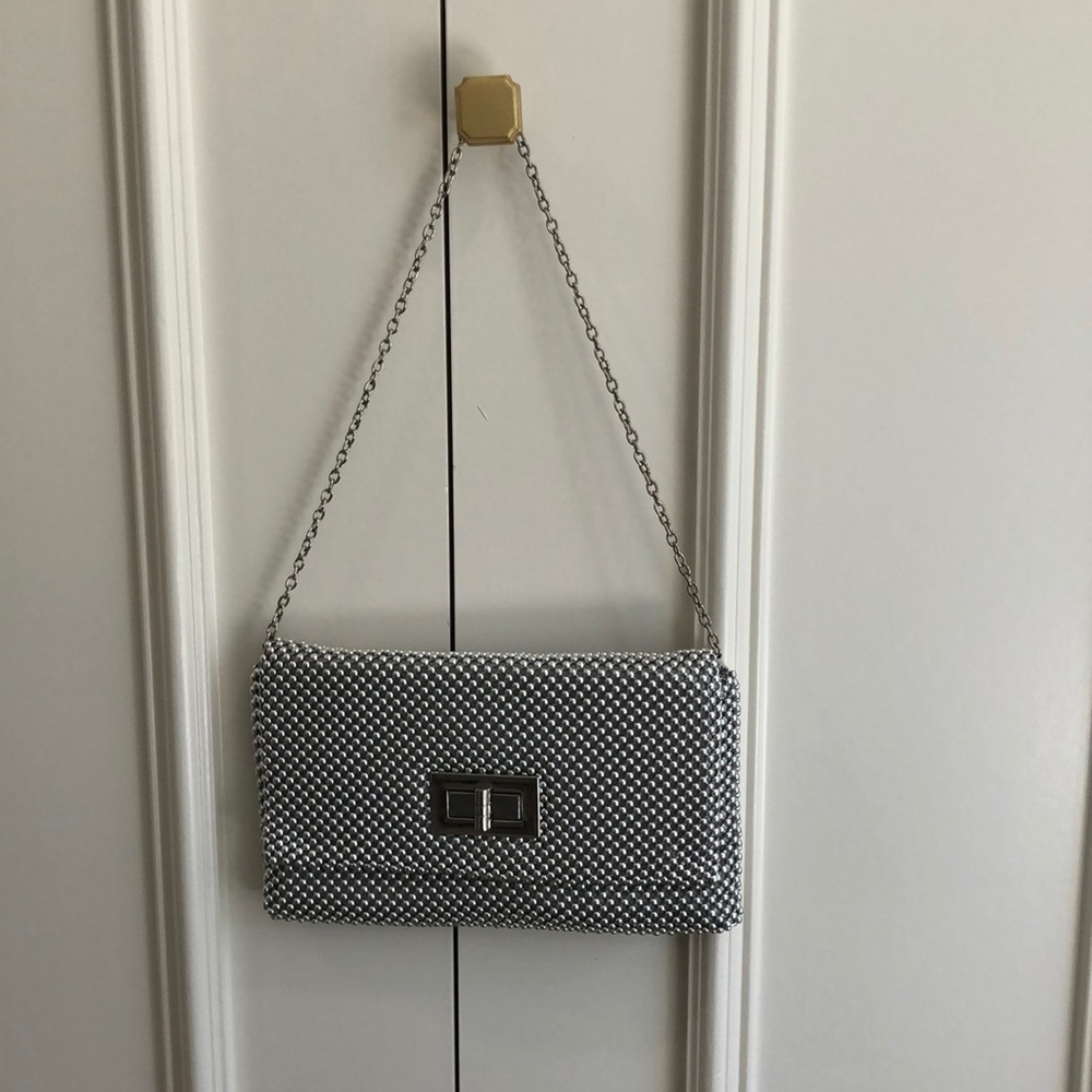 Silver beaded purse / clutch. About 5x8 inches.
